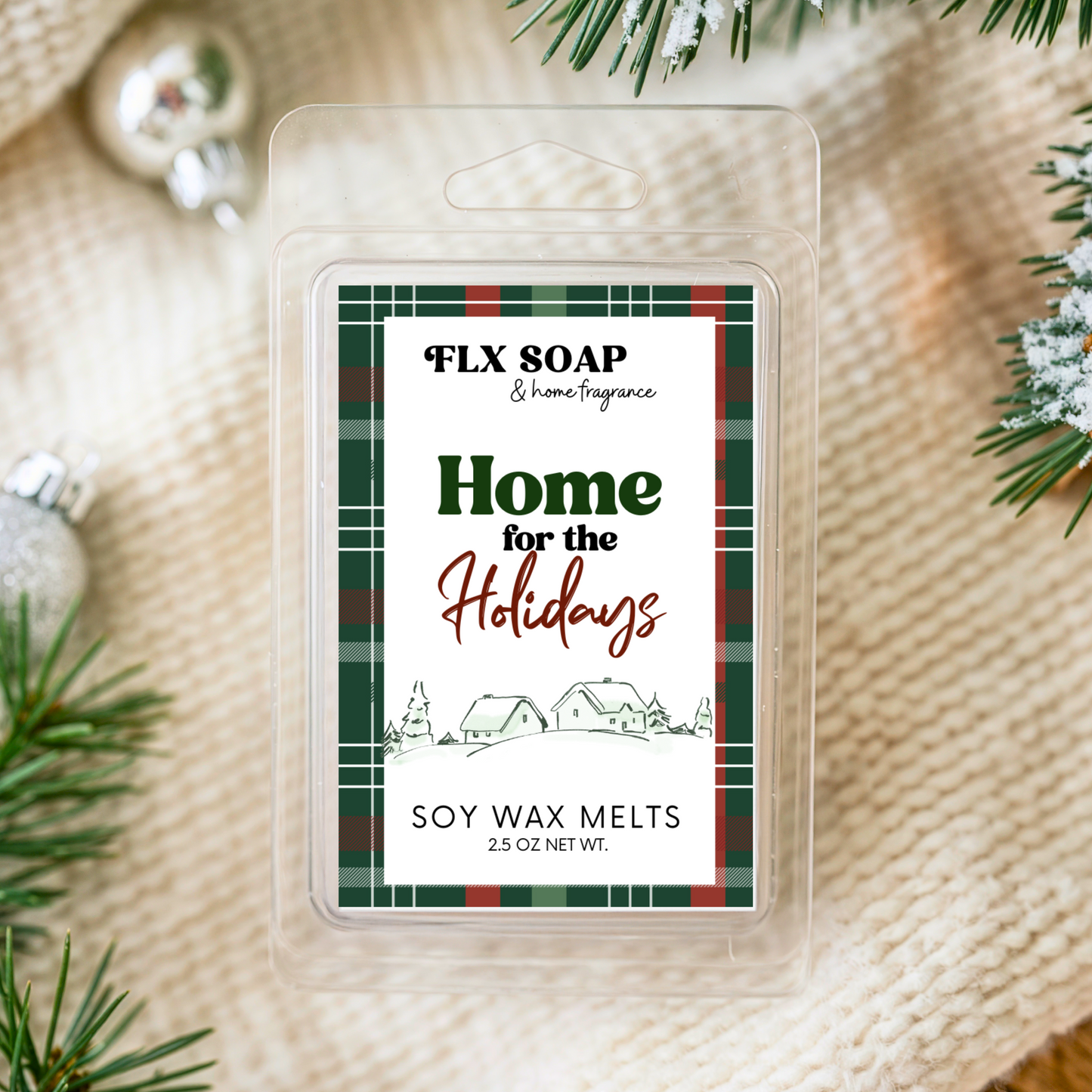 Flx Soap soy wax melts packaging with Christmas-themed design on a textured fabric background.